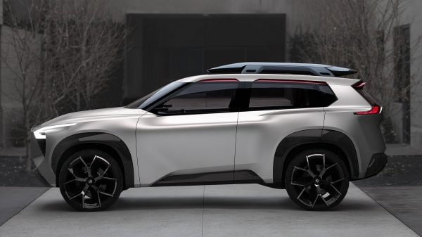 Side profile of a silver Nissan Xmotion autonomous intelligent concept SUV