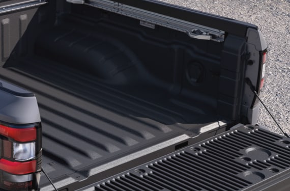 A close up of the 2022 Nissan Frontier's cargo area