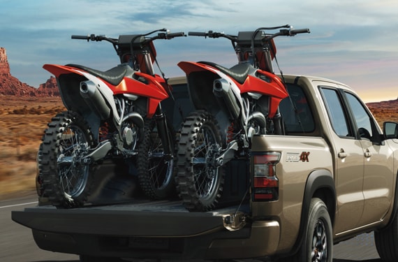 2022 Nissan Frontier carrying cargo of two motorcycles