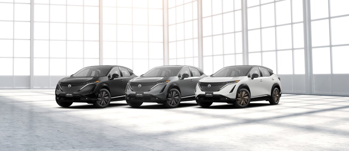 Nissan ARIYA in Black, Grey, and White side by side.