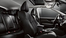 2022 Nissan Qashqai with black interior view of back seats and front seats from passenger side