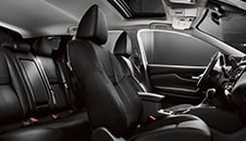 2023 Nissan Qashqai with black interior view of back seats and front seats from passenger side