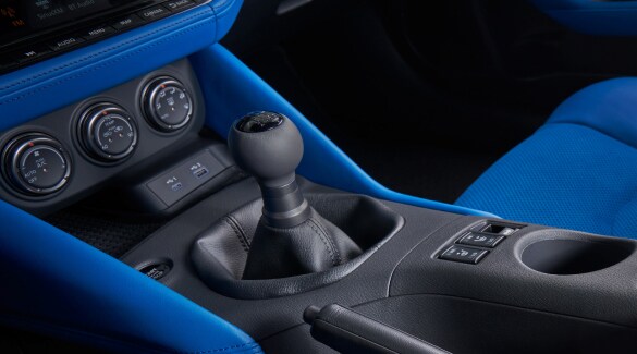 2023 Nissan Z blue interior showing manual gear shifter.
