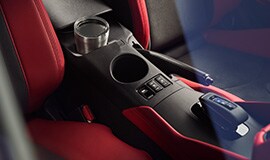 2023 Nissan Z red interior showing centre console and gear shifter.