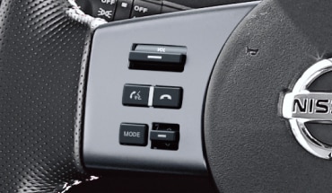 Closeup of Nissan Xterra steering wheel controls