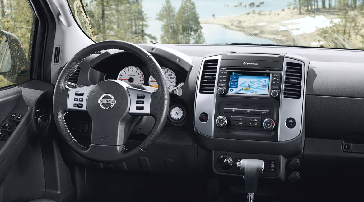 Interior view of Nissan Xterra steering wheel and dashboard