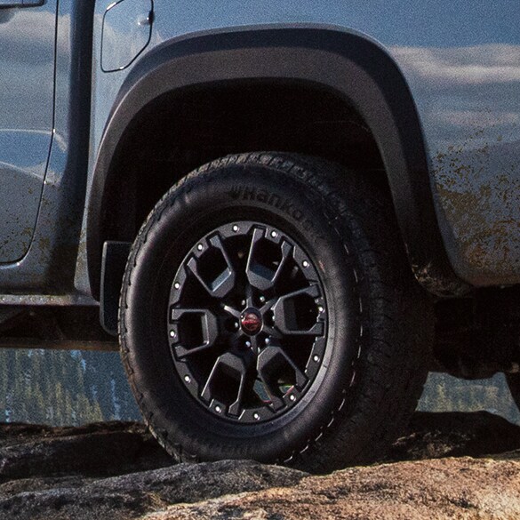 2022 Nissan Frontier off-road tires and overfenders.