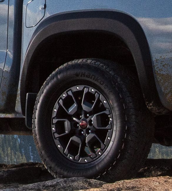 2023 Nissan Frontier close up of tire and over fender.