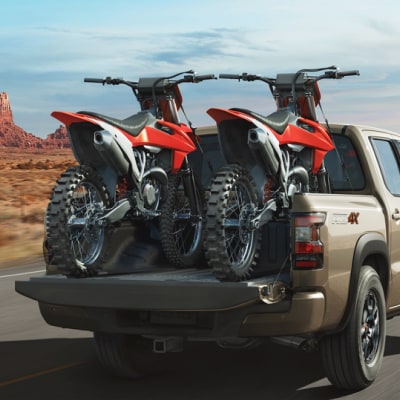 2024 Nissan Frontier with two bikes in the bed