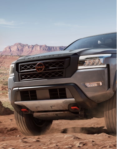 2024 Nissan Frontier headlights and grille feature