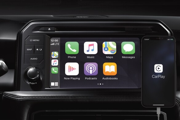 2023 Nissan GT-R touch-screen showing Apple CarPlay® icons.