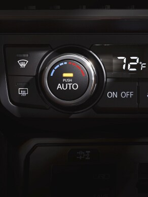 2023 Nissan GT-R climate control panel with etched aluminum bezels.
