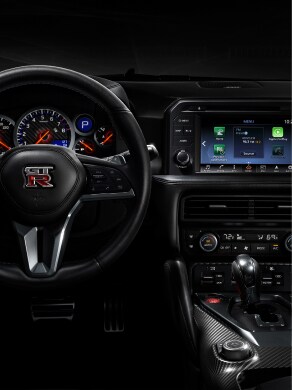 2023 Nissan GT-R cockpit view showing multi-function display system.