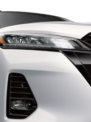 2023 Nissan Kicks close up of LED headlights