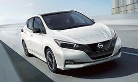 2023 Nissan LEAF in white on a highway daytime