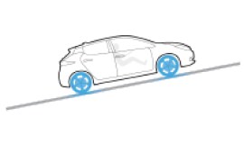 2024 Nissan LEAF hill start assist illustrated by car going up a hill