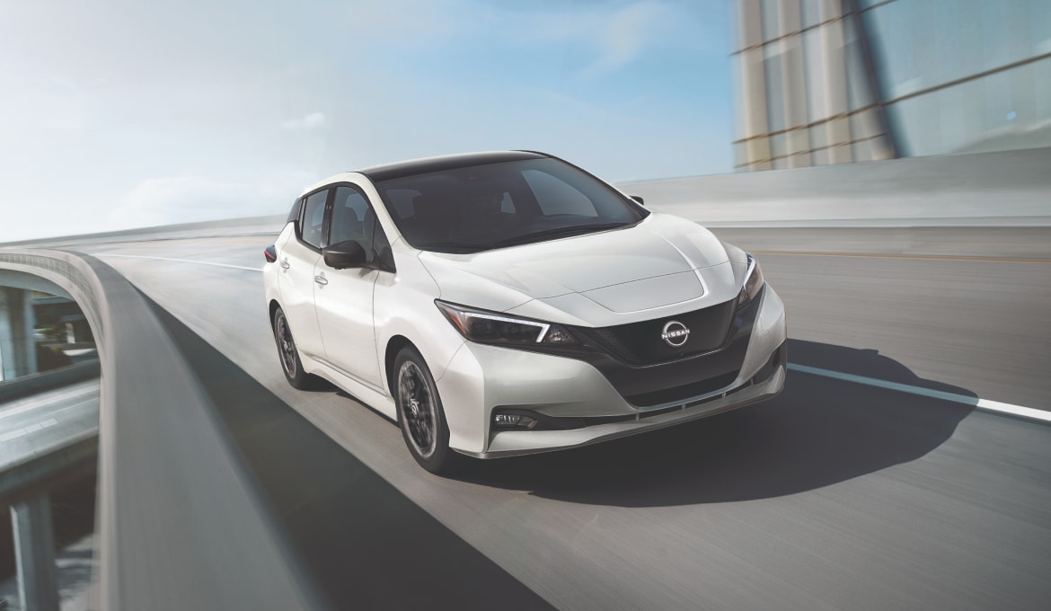 2025 Nissan LEAF in white on an overpass