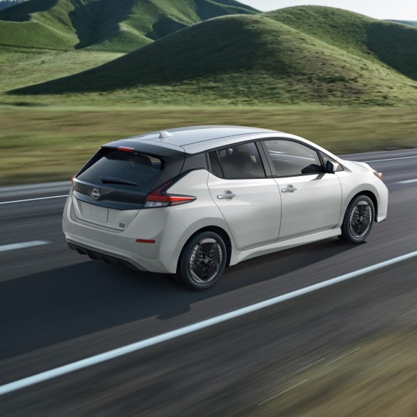 2025 Nissan LEAF driving in the outskirts