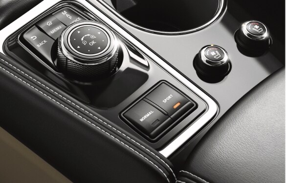 2023 Nissan Maxima drive mode select buttons for normal and sport modes.