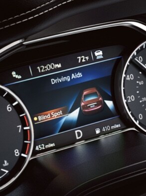 2023 Nissan Maxima gauge screen showing Advanced Drive Assist Blind Spot Warning.