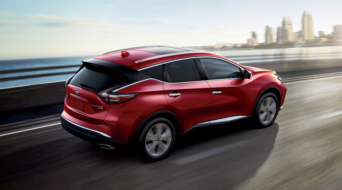 2023 Nissan Murano driving swiftly on highway to illustrate suspension and handling.