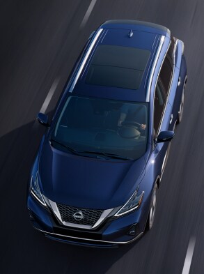 2023 Nissan Murano in motion demonstrating its striking blue colour.