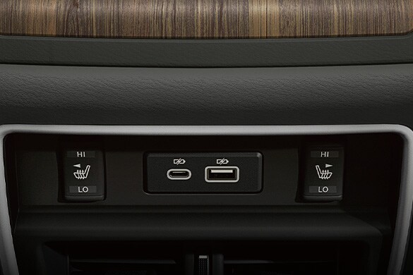 2023 Nissan Murano closeup of switches that control heated rear seats.