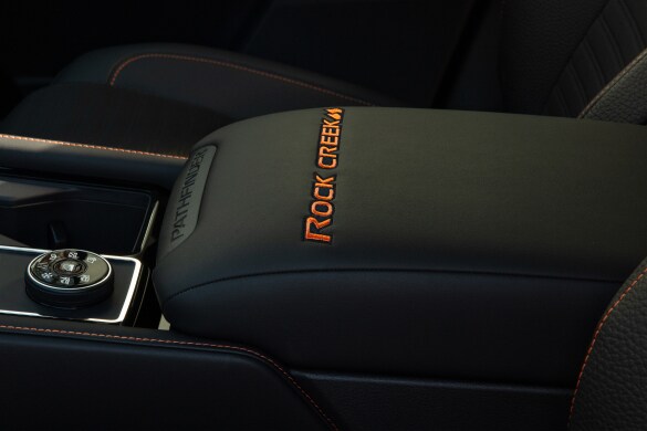 2023 Nissan Pathfinder Rock Creek logo stitched on centre console
