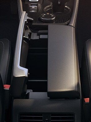 2023 Nissan Rogue floating centre console with smart storage space open. 