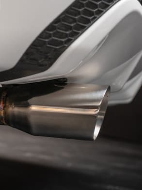 Closeup of Nissan Sentra exhaust pipe