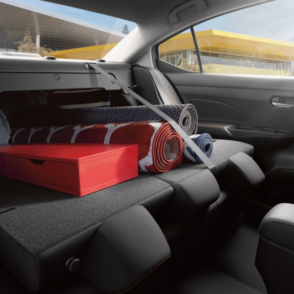 2024 Nissan Versa Interior view of folded seats for trunk space