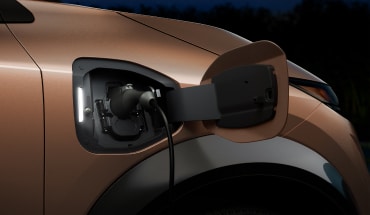 Close up of Nissan EV charging plug
