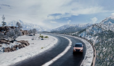 Nissan ARIYA on snowy mountain road