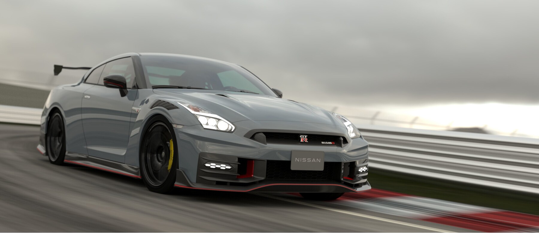 2024 Nissan GT-R Nismo driving down race track 