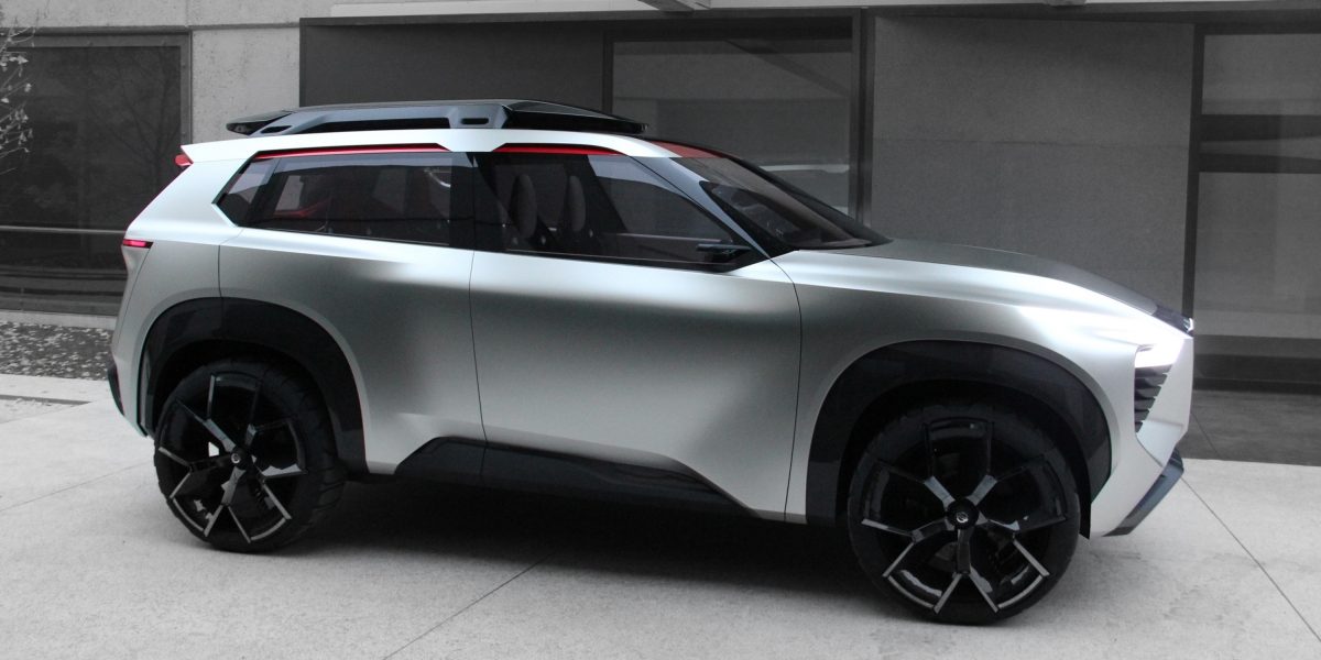 Side view of a parked silver Nissan Xmotion autonomous intelligent concept SUV
