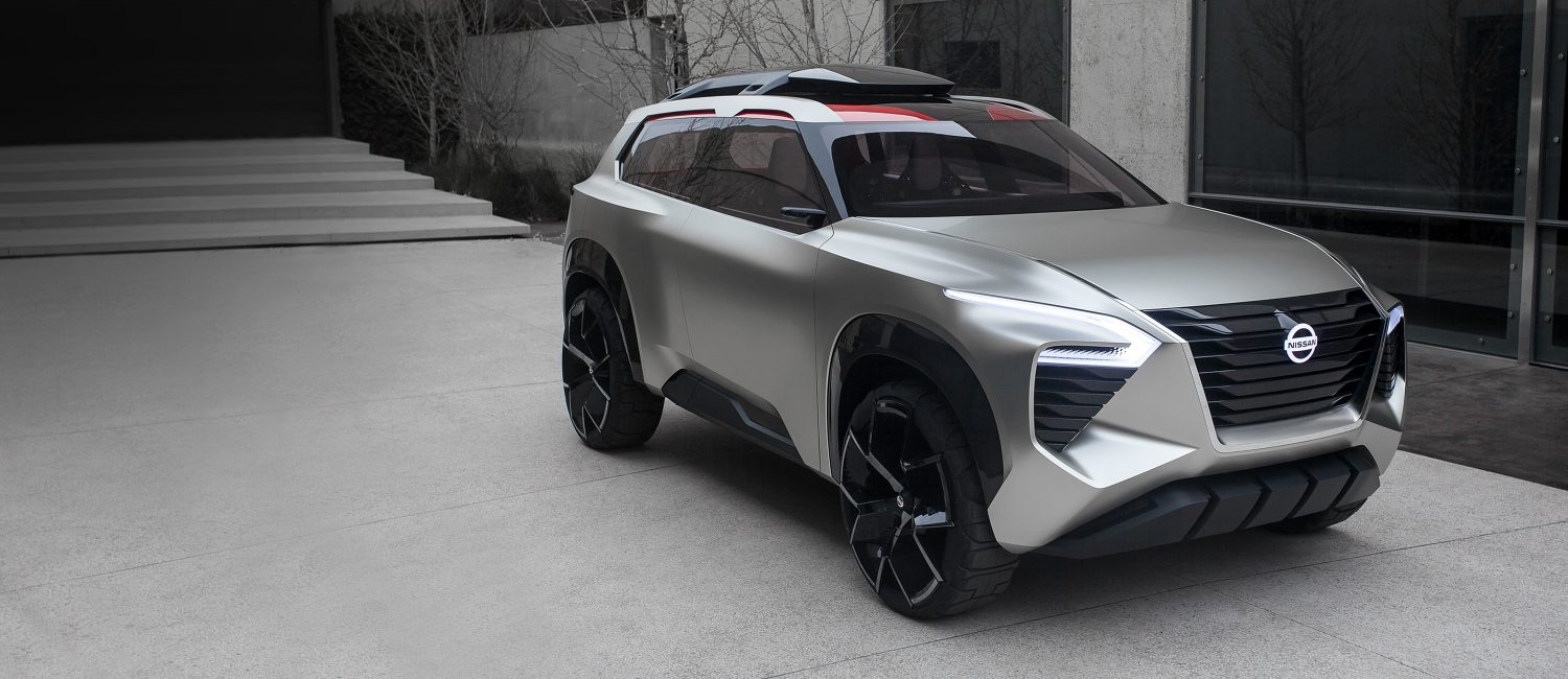 Angled view of a silver Nissan Xmotion autonomous intelligent concept SUV