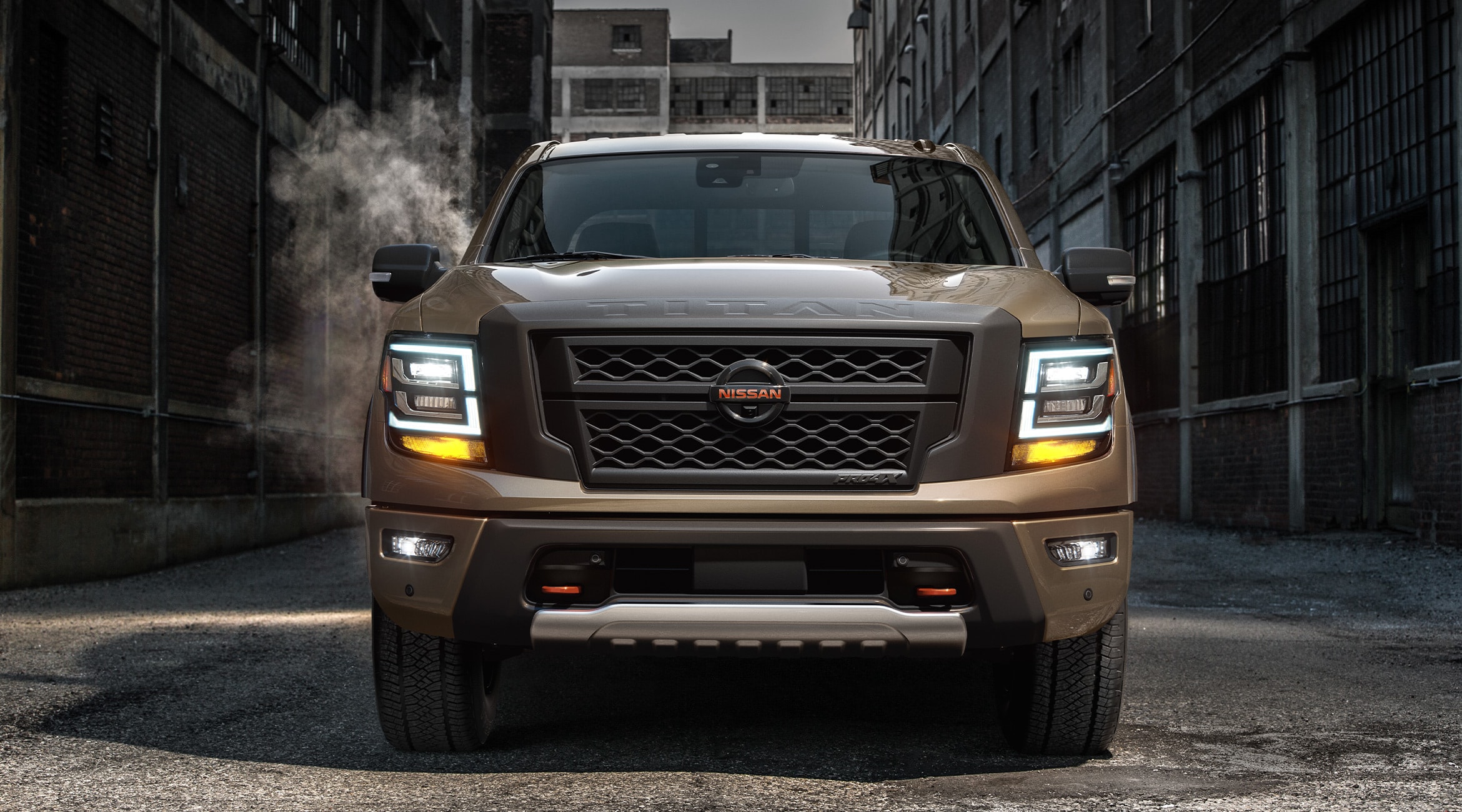 Front profile of a brown Nissan Titan Truck